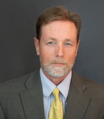 Portrait of Darin Hines, Realtor®.